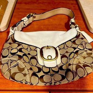 Coach purse. Tan and brown fabric with cream leather